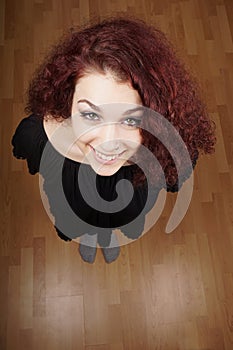 Wide high angle view of beautiful young woman
