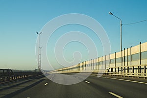 Wide highway. long roadway. road going into the distance