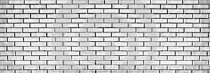 Wide light gray brick wall texture. Whitewashed panoramic background