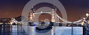 Wide night panorama of London Tower bridge