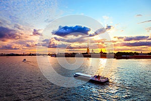 A wide night view of Neva river at White nights time in Saint-Petersburg, russia