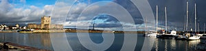 Wide Panorama of Carrickfergus castle and marina near Belfast