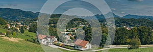 Wide panorama of Rogaska Slatina village below, with visible backdrop of mountains and hills in the vicinity