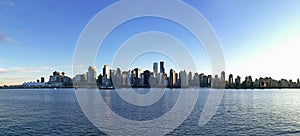 Wide panorama of Vancouver skyline. A view from Stanley Park.