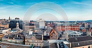 A wide panoramic looking out over buildings in Glasgow city centre. Scotland, United Kingdom photo