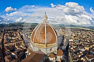 Wide panoramic view of Florence with a dome of Santa Maria del Fiore cathedral in front