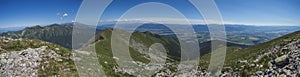 Wide panoramic view with top of Baranec peak on Western Tatra mountains or Rohace panorama. Sharp green mountains with photo