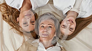 Wide portrait of three generations of Caucasian women