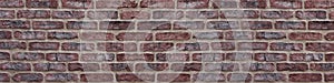 Wide red brick wall texture. Orange brickwork panoramic background
