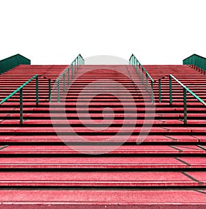 Wide red staircase qith green rails