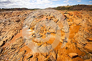 Wide river bed Betsiboka, flushes red soil after heavy rains in Madagascar