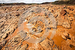 Wide river bed Betsiboka, flushes red soil after heavy rains in Madagascar