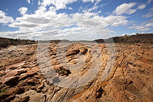 Wide river bed Betsiboka, flushes red soil after heavy rains in Madagascar photo