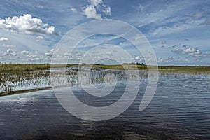 Wide river landscape and cloudscape, Everglades, Florida, USA
