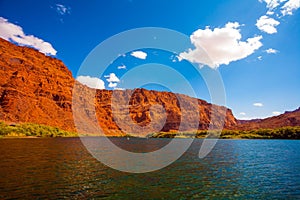 Wide river and tall green grass