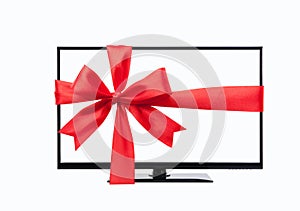 Wide screen tv monitor tied with red ribbon