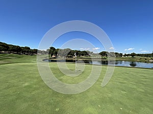 Beautiful golf hole on a large lake