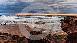 Wide shot of a beautiful sea under a cloudy sky