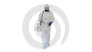 Disinfectant walking with antiviral liquid tank looking to camera on white background.