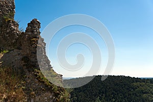 Wide shot of landscape with ruined walls of castle Cachtice in frame