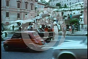 Wide shot of people milling around Spanish Steps, Rome, Italy