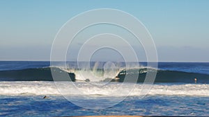 Wide shot of a wave breaking at pipeline on the north shore