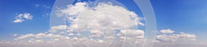 Wide sky panorama with scattered cumulus clouds