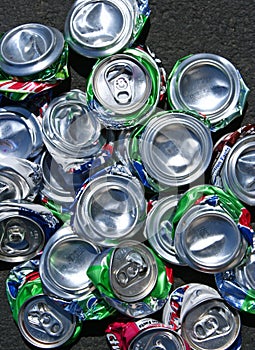 Wide top view of a pile of crushed soda cans