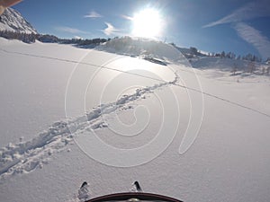 The wide trail of skitour with helmet view photo