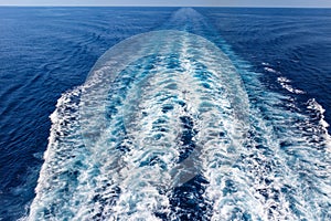 Wide turbulent wake behind a speeding boat