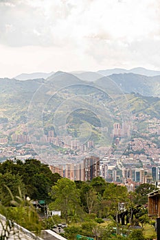 wide vertical shot of el poblado in medellin colombia during the sunrise photo