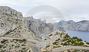 Wide view of Cape Formentor viewpoint with blurred tourists and