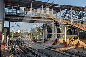 Wide view of curve train tracks and foot over bridge, Chennai, Tamil nadu, India, Mar 29 2017