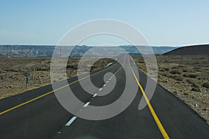 Wide view of desert road through the Isreal southwest.