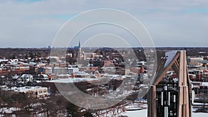 Wide view of drone panoramic aerial view of a Naperville city covered with snow in winter time, american city with a