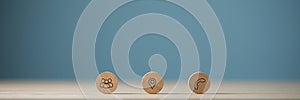 Wide view image of three wooden cut circles with contact and information icons on them