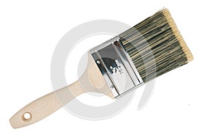 The wide wooden paint brush