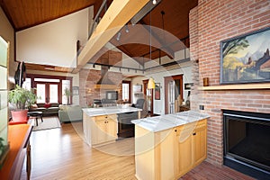 wideangle of prairie home combining brick walls and wooden beams