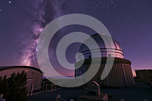 wideangle shot of observatory with celestial background
