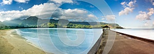 Widescreen panorama of Hanalei Bay and Pier on Kauai Hawaii