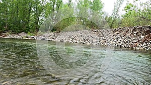 widescreen on the river bank on a gray day, and rain and in the background - panoramic 5k with gimbal