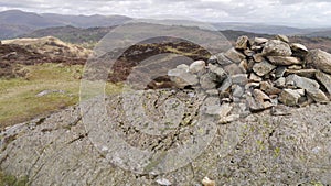Summit cairn on Holme Fell, Lake District photo