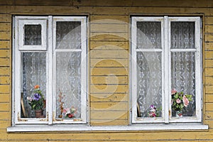 Widows in wooden building