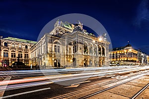 Wien opera building facade at night and traffic trails