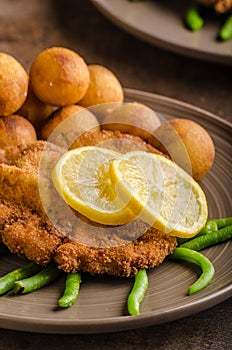 Wiener schnitzel with croquettes