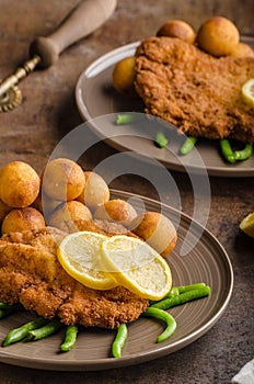 Wiener schnitzel with croquettes