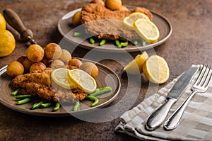 Wiener schnitzel with croquettes