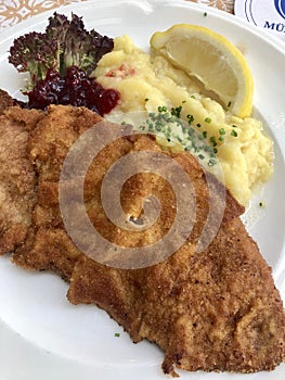 Wiener schnitzel with Kartoffelsalat, traditional german potato salad