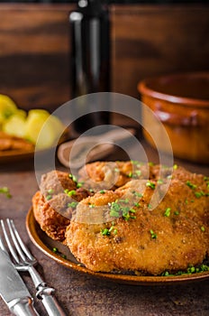 Wiener schnitzel with potatoes photo