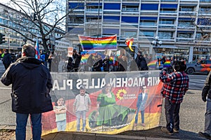 farmer with their tractors demonstrate for cutting down the price for diesel with poster wir machen alles kaputt - engl we destroy